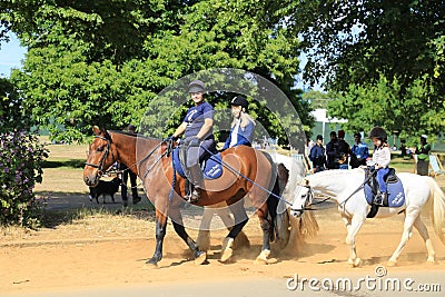 Family on horses Editorial Stock Photo