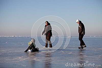 Family ice skating Stock Photo