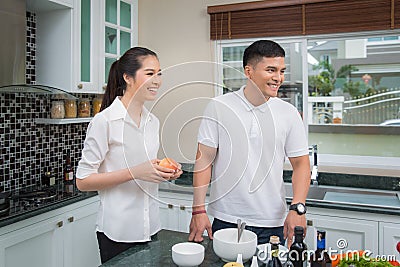 Family just married in kitchen room Stock Photo