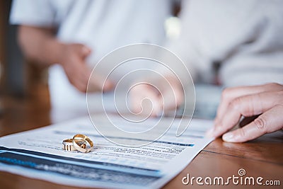Family law, divorce and marriage court for couple with a contract, document or legal paperwork to sign agreement. Ring Stock Photo