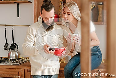 Family leisure couple coffee kitchen smartphone Stock Photo