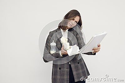 Modern woman balancing worklife and family life. Mother and businesswoman. Working and taking care of children Stock Photo