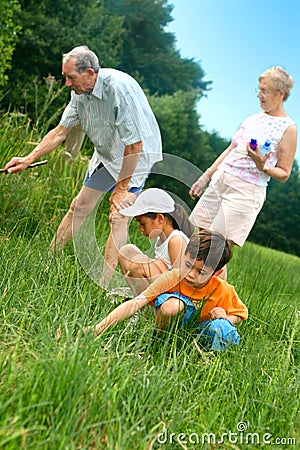 Family looking for insects Stock Photo