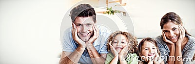 Family lying on a carpet Stock Photo