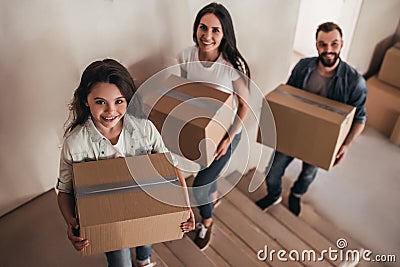 Family moving in new house Stock Photo