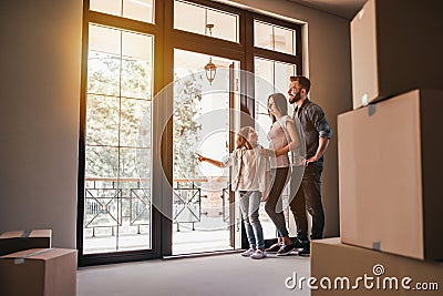 Family moving in new house Stock Photo