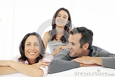 Family with one child - teenage girl - parents - portrait Stock Photo