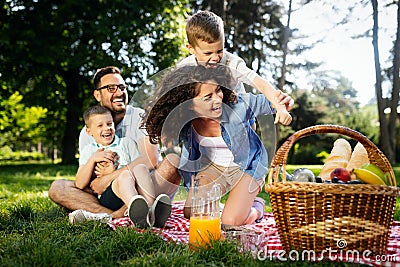 Family picnic outdoors togetherness relaxation happiness concept Stock Photo