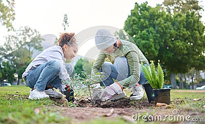 Family, plant and gardening in a park with trees in nature environment, agriculture or garden. Volunteer woman and child Stock Photo