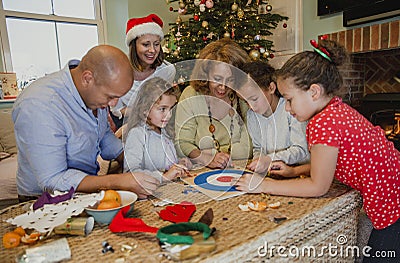 Playing Board Games At Christmas Stock Photo