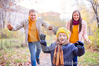 Family playing catch-up Stock Photo