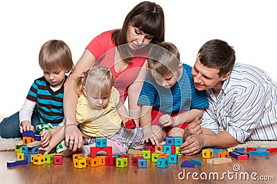 Family are playing on the floor Stock Photo