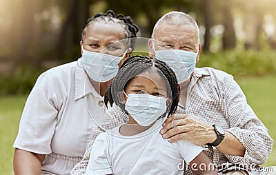 Family portrait, covid and face mask outdoor at nature park with child and grandparents together on picnic for love Stock Photo