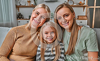 Family portrait of mother, daughter and grandmother. Generations of women. Concept of women`s day, mother`s day, motherhood, Stock Photo