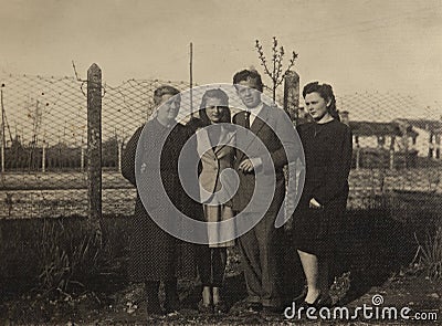 Family portrait outdoor in 40s Editorial Stock Photo