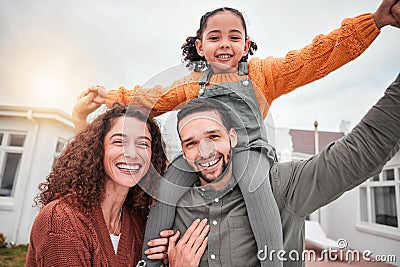 Family portrait, piggy back and happy man, woman and child in yard of new house, happiness and security at home Stock Photo