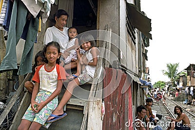 Family Portrait of very poor Filipino family, Manila Editorial Stock Photo