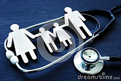 Family practices. Figures and stethoscope. Health care. Stock Photo