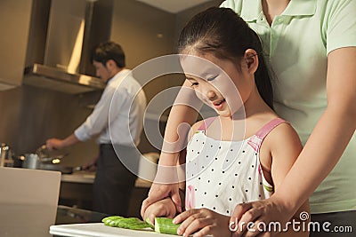 Family preparing dinner Stock Photo