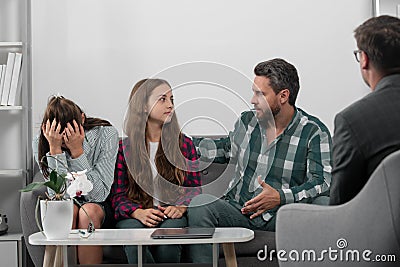 Family at psychology session. Psychologist with young couple, psychotherapist or marriage counselor listen mental health Stock Photo