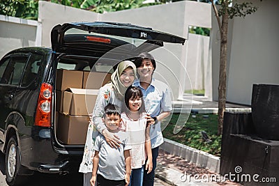 Family ready to move to the new house Stock Photo