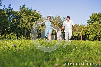 Family and Relationships Concepts. Happy Young Family Spending Time Together Stock Photo