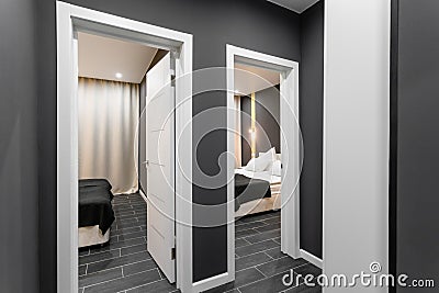 Inexpensive family room. Hotel standart two bedroom. simple and stylish interior. interior lighting Stock Photo