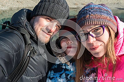 Family selfie at winter journey. Stock Photo