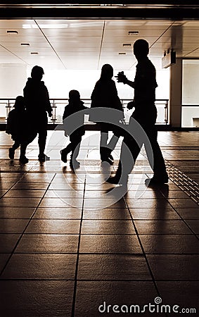 Family silhouette in station Stock Photo