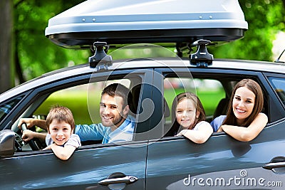 Family sitting in the car Stock Photo