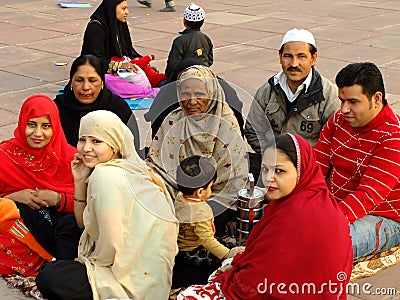 Family sitting in a courtyard of Jama Masjid, Delhi Editorial Stock Photo