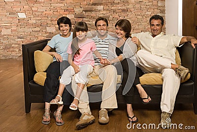 Family on a sofa Stock Photo