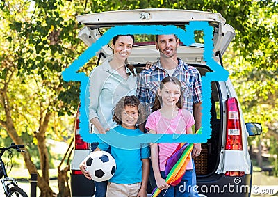 Family standing on the road against house outline in background Stock Photo