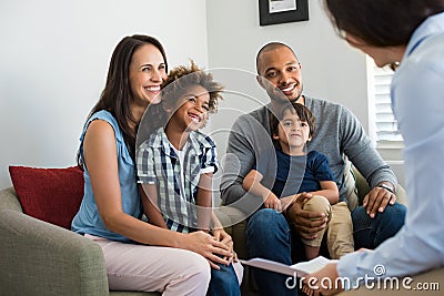 Family talking with counselor Stock Photo