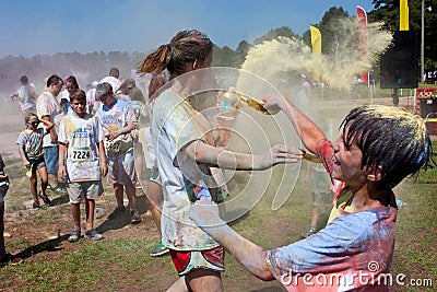 Family Throws Colored Corn Starch At Bubble Palooza Event Editorial Stock Photo