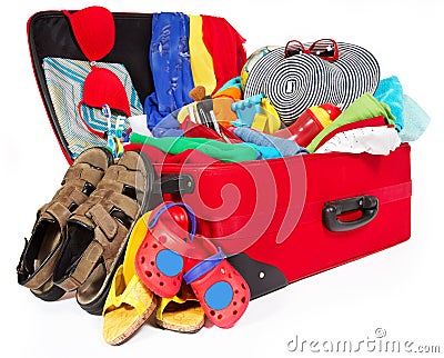 Family travel red suitcase packed for vacation Stock Photo