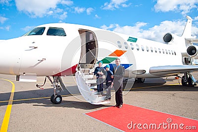 Family Travelling by Commercial Airplane Stock Photo