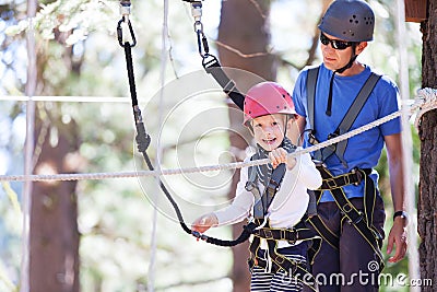 Family at treetop park Stock Photo