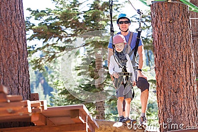 Family at treetop park Stock Photo