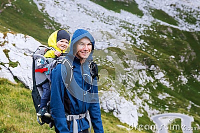 Family on a trekking day in the mountains. Mangart, Julian Alps, National Park, Slovenia, Europe. Stock Photo