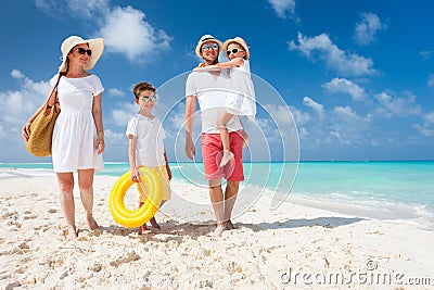 Family on a tropical beach vacation Stock Photo