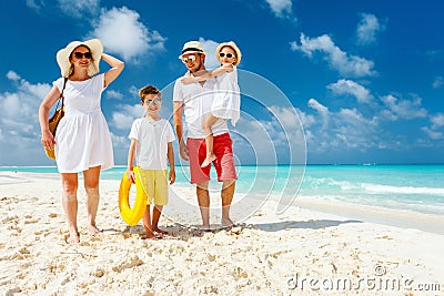 Family on a tropical beach vacation Stock Photo