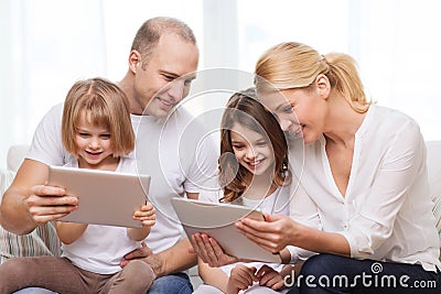 Family and two kids with tablet pc computers Stock Photo