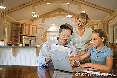 Family using computer Stock Photo