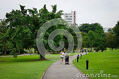 A family walking at the Botanic Garden in Singapore Editorial Stock Photo