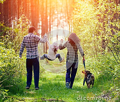 Family walking in the forest Stock Photo