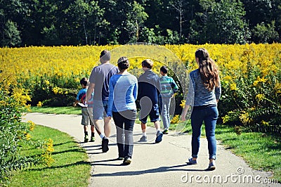 Family Walking on Path Stock Photo