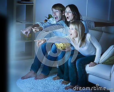 Family watching TV Stock Photo