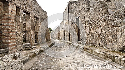 General view of the ancient Pompeii brick street view Editorial Stock Photo