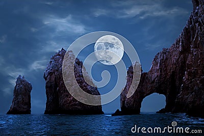 Famous arches of Los Cabos. Mexico. Baja California Sur. Rocky formations at moonlight background. Stock Photo